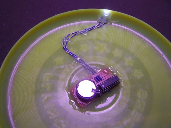 Build this microcontroller controlled rainbow flying disc - and then throw it!