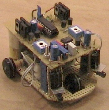 Small 3-wheel ROBOT with PIC16F84 brain & InfraRed eyes.