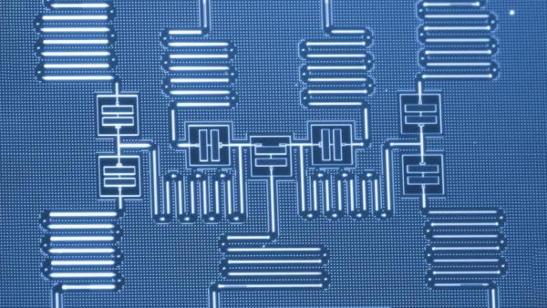 THREE QUANTUM COMPUTER COMPONENTS INTEGRATED ON ONE CHIP