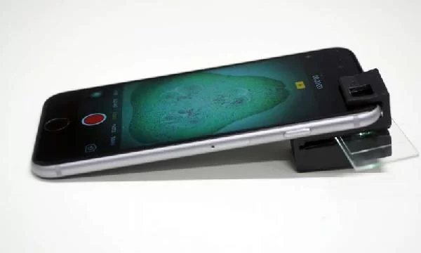 3D PRINTED CLIP ON TURNS ANY SMARTPHONE TO A HOUSEHOLD MICROSCOPE.