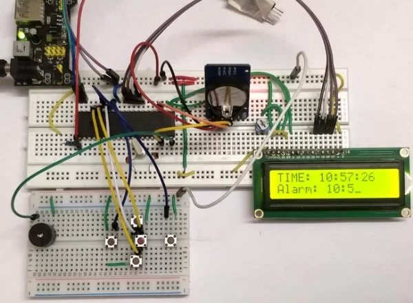 Working of Digital Alarm Clock using PIC16F877A with Pic-microcontroller