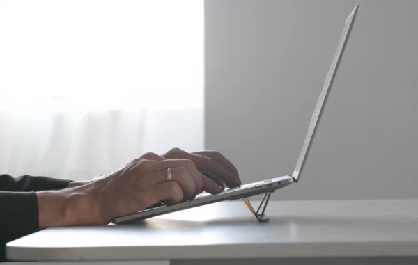 TESMO KICKSTAND TRULY INVISIBLE LAPTOP STAND THAT WEIGHS NOTHING AND TAKES UP ZERO SPACE